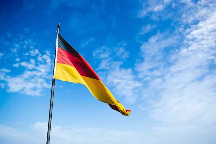 The photo showing German flag. Indicating the topic German e-commerce 2025 outlook.