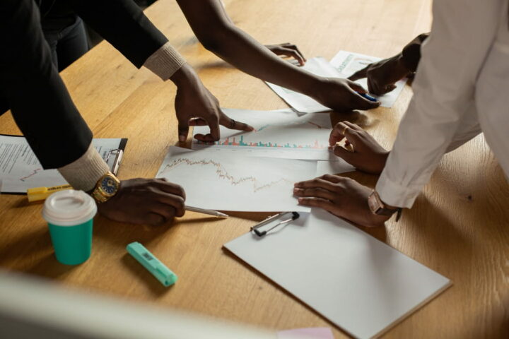 Photo showing the group of people working at a performance marketing campaign